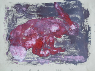 Hare in flight in august 2 - framed by Mania Row