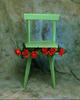 Chair Eating Roses by Ciuco Guti&eacute;rrez
